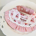 Load image into Gallery viewer, Pastel pink strawberry milk pet bandana collar styled on lace plate