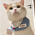 Load image into Gallery viewer, Orange and white cat wearing cute cartoon print blue denim bandana collar