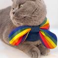 Load image into Gallery viewer, Close up of rainbow striped bow tie on handmade denim cat collar, pride month pet accessory by GraviPaw