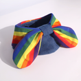 Load image into Gallery viewer, Full body photo of grey cat wearing GraviPaw rainbow pride bow collar, handmade denim cat accessory for pride month