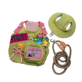 Load image into Gallery viewer, Green cat harness vest with sun hat and braided leash flat lay showing star patches and mini backpack detail
