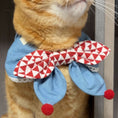 Load image into Gallery viewer, Denim bow bandana collar with red pom-poms on orange cat by GraviPaw