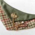 Load image into Gallery viewer, Close-up of GraviPaw personalized leather name tag engraved Holmes on houndstooth bandana
