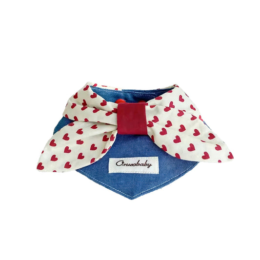 Adjustable denim heart bow pet collar with snap-button closure on white background