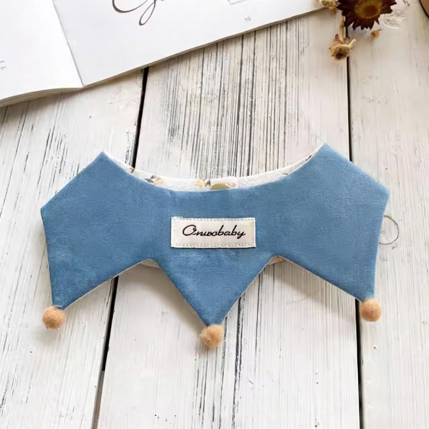 Flat lay of blue denim side reversible pet bandana collar