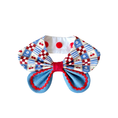 Load image into Gallery viewer, Front view close up of cherry patchwork print oversized bow dog collar bandana showing red polka dot snap buttons and layered bow detail
