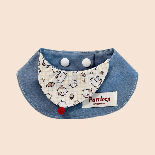 Cute cartoon pet collar bandana with soft blue denim and playful animal print for cats and dogs
