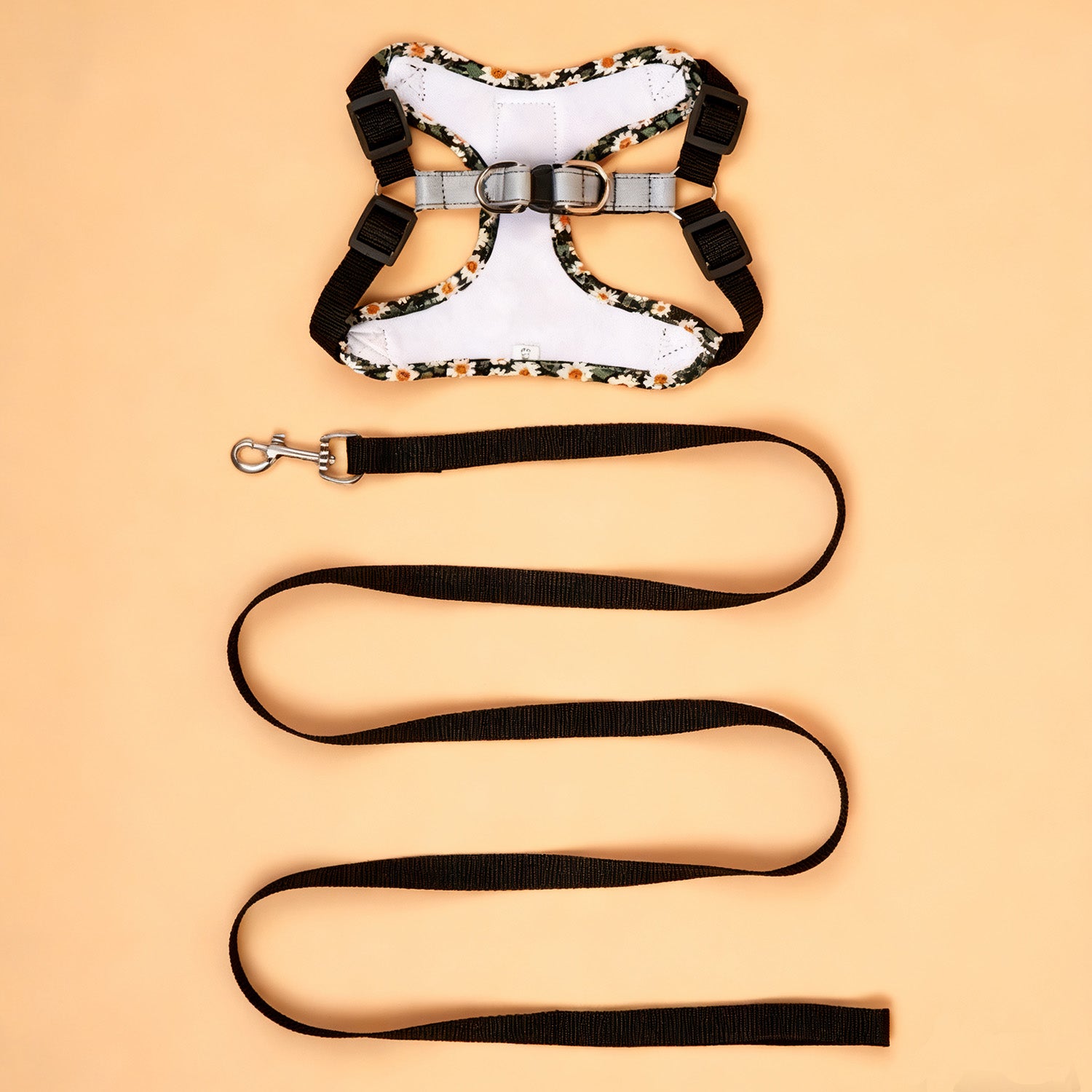 Daisy bloom dog harness and matching black leash set flat lay