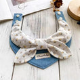 Load image into Gallery viewer, Soft cotton floral bow pet collar with blue denim base lifestyle shot
