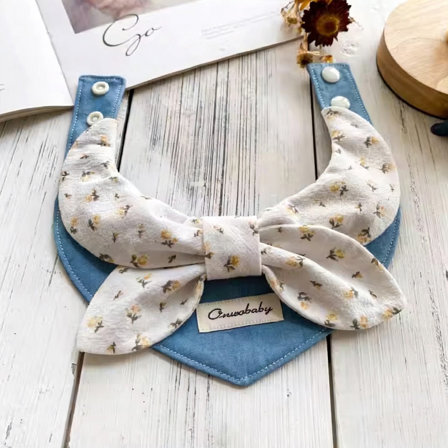 Soft cotton floral bow pet collar with blue denim base lifestyle shot