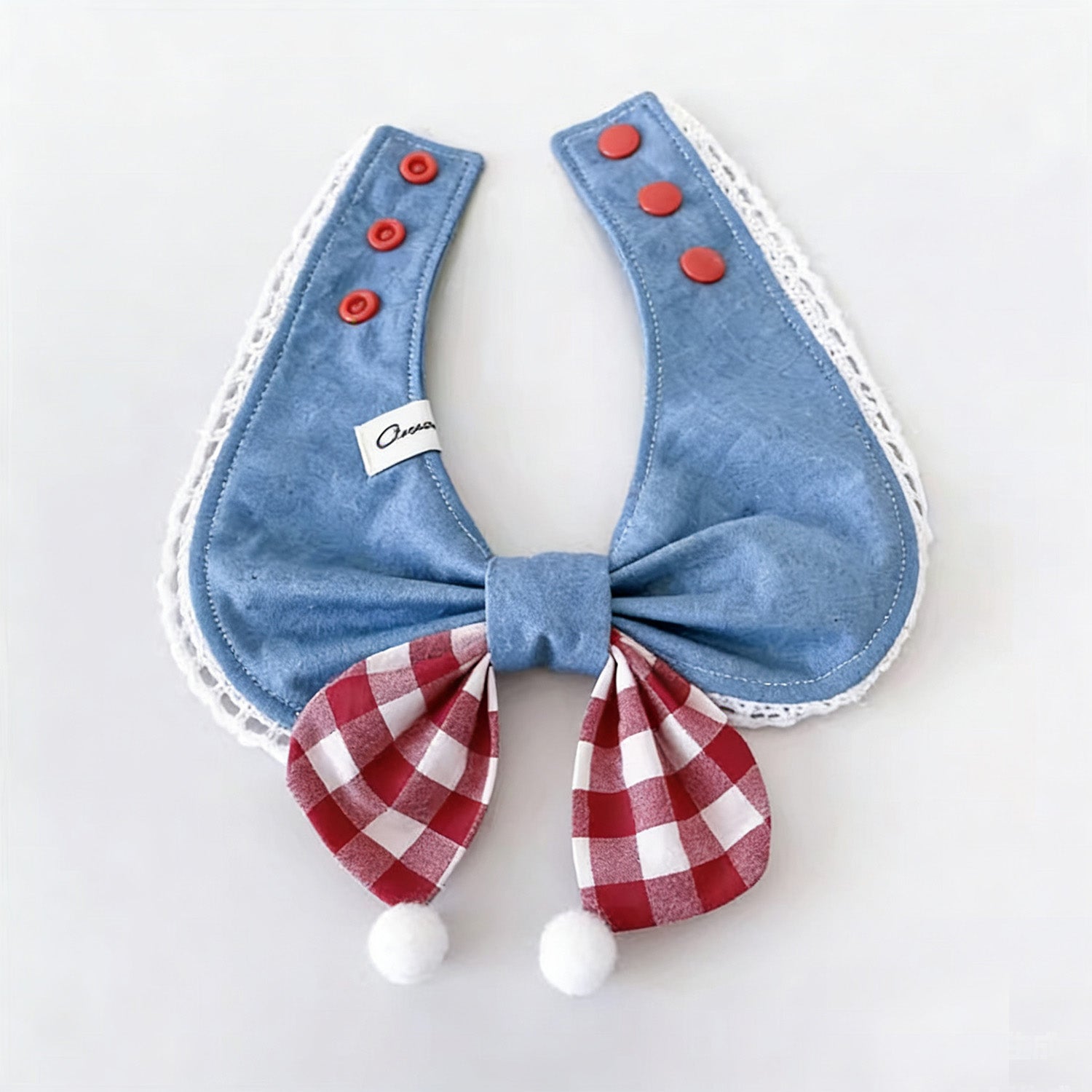 Soft cotton blue denim pet collar with red gingham bow lifestyle shot
