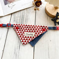 Load image into Gallery viewer, Red white diamond pattern pet bandana collar with denim base flat lay
