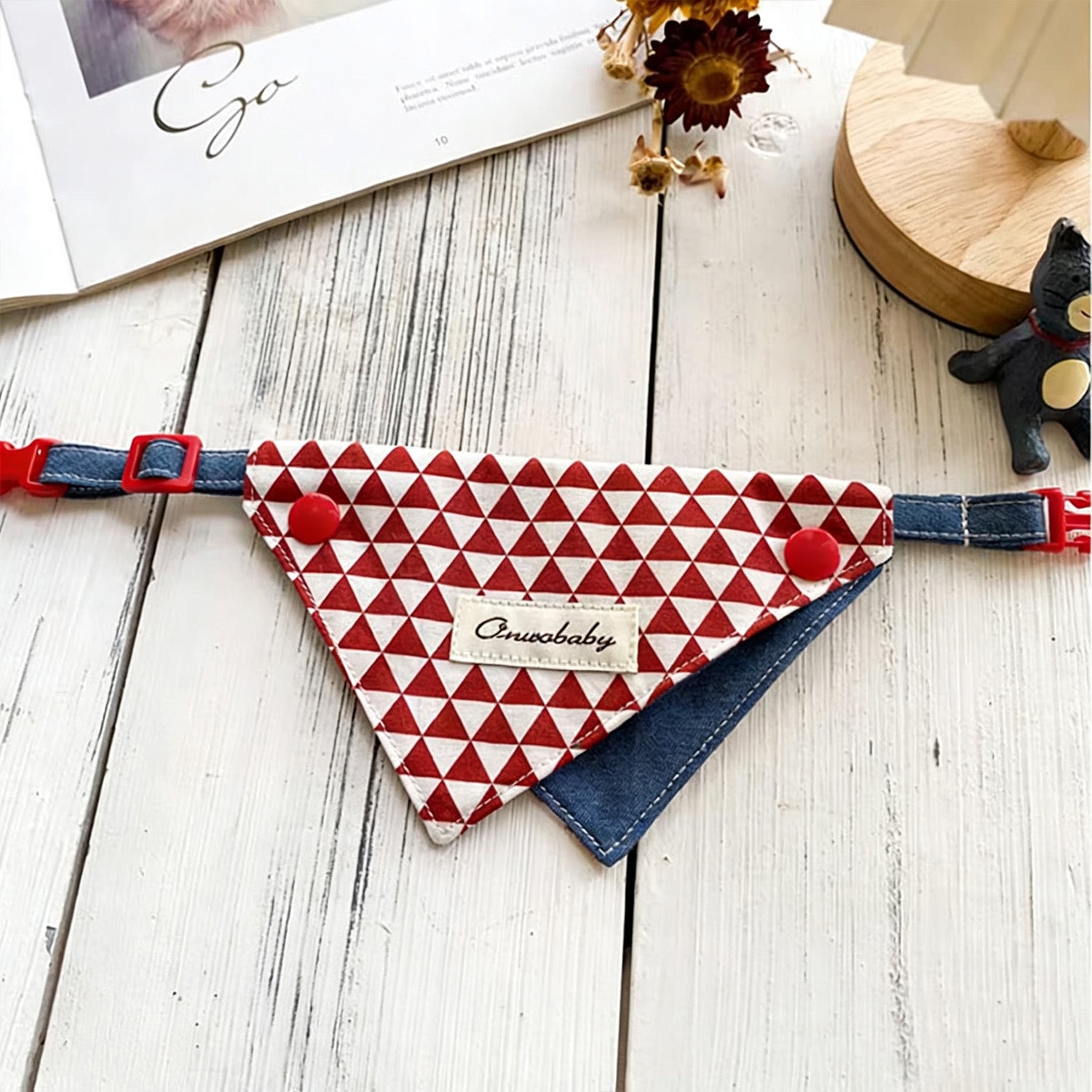 Red white diamond pattern pet bandana collar with denim base flat lay