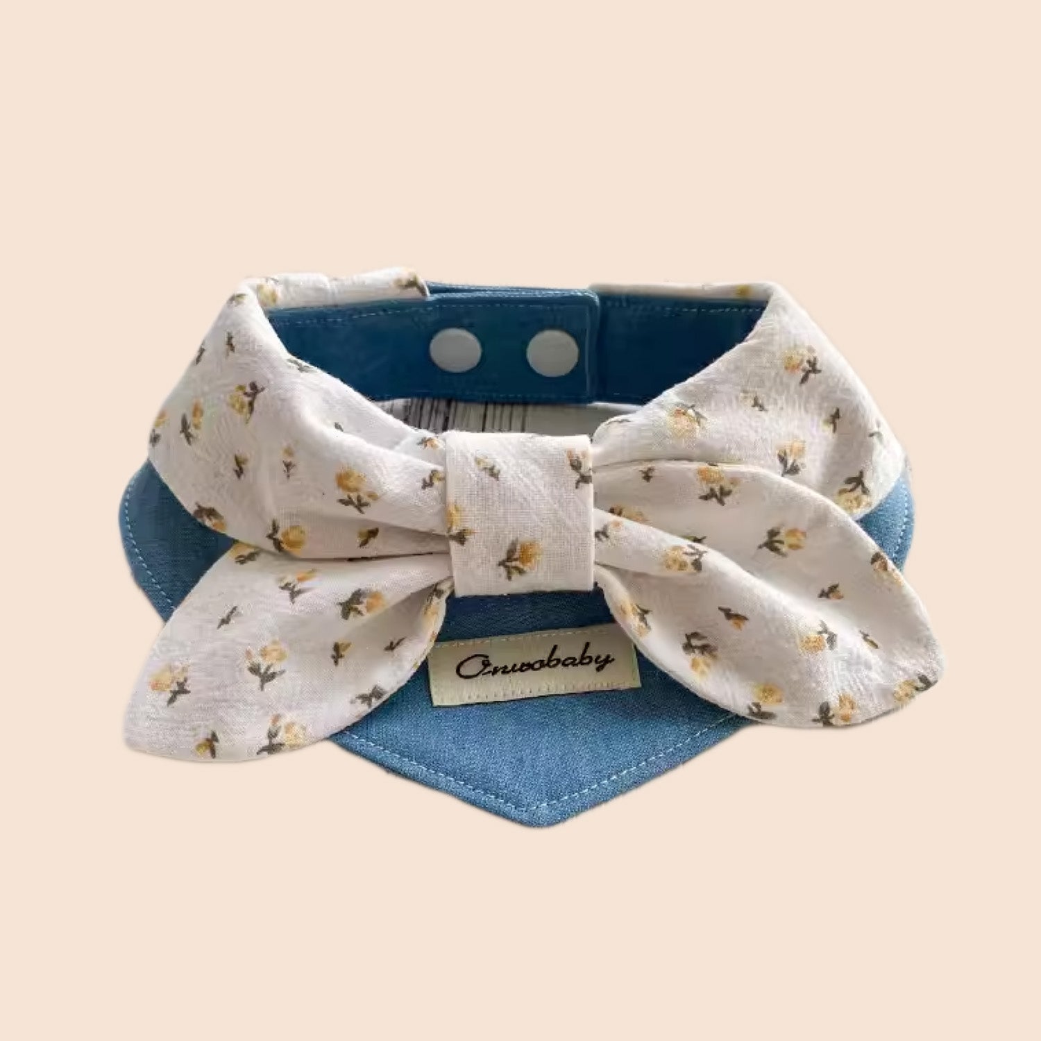 Floral bow pet bandana collar with cream flower print and blue denim base for cats and dogs
