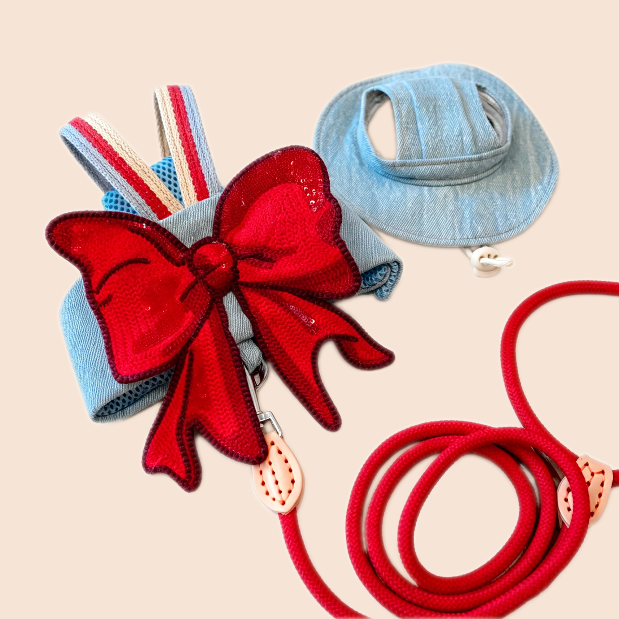 GraviPaw red bow denim cat harness set with matching red leash and denim cat hat on beige background