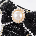 Load image into Gallery viewer, Pearl-style bow accent detail on luxury black tweed dog harness
