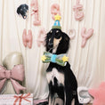 Load image into Gallery viewer, Black and white small dog wearing green plush bow bandana at indoor birthday party with pink balloon decorations
