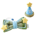 Load image into Gallery viewer, Blue birthday hat and green plush bow bandana set flat lay showing elastic attachment and yellow star details
