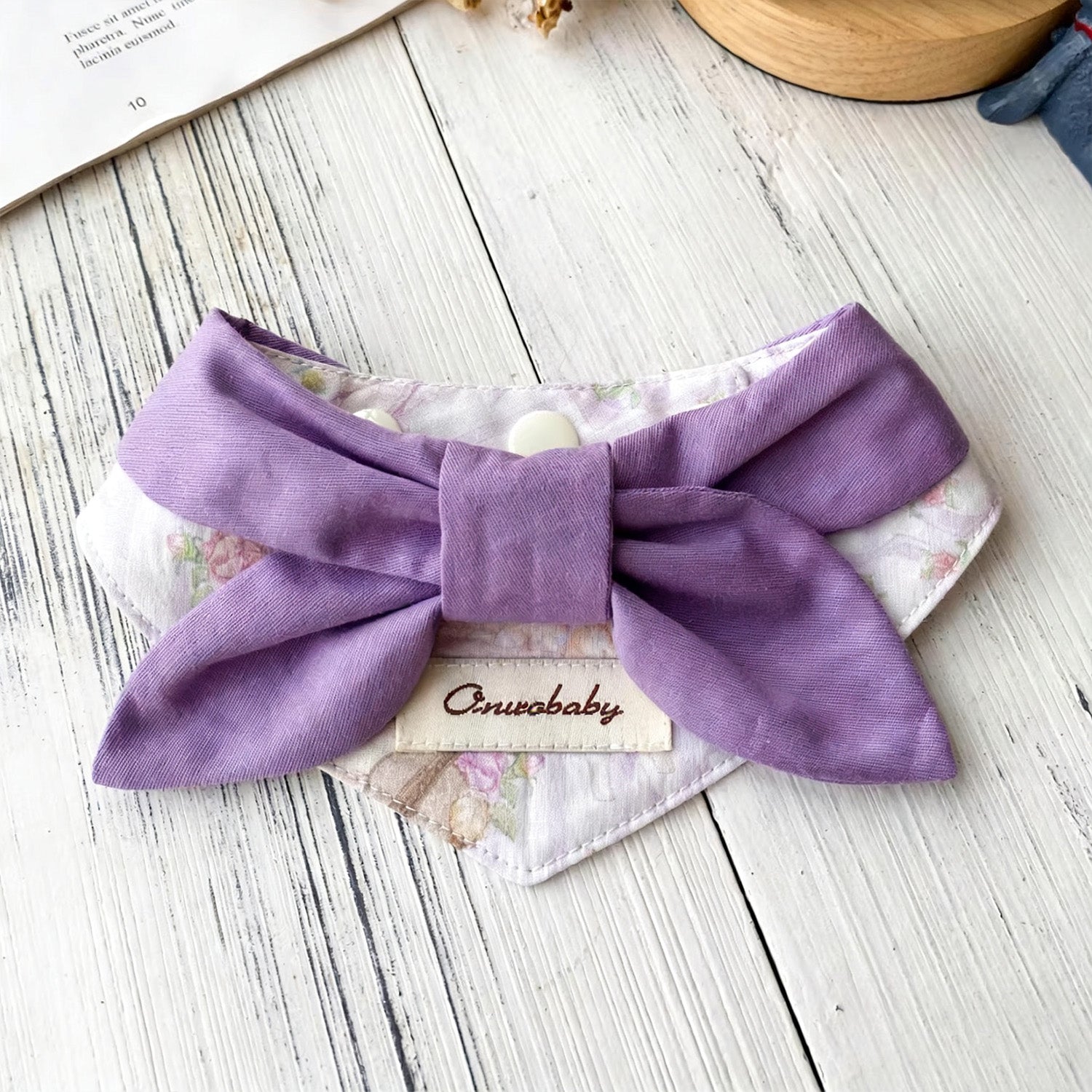 Soft cotton lavender bow pet collar with delicate floral pattern lifestyle shot