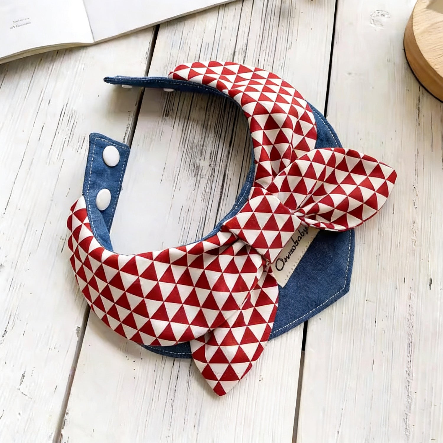 Red white geometric triangle bow pet bandana collar detail view