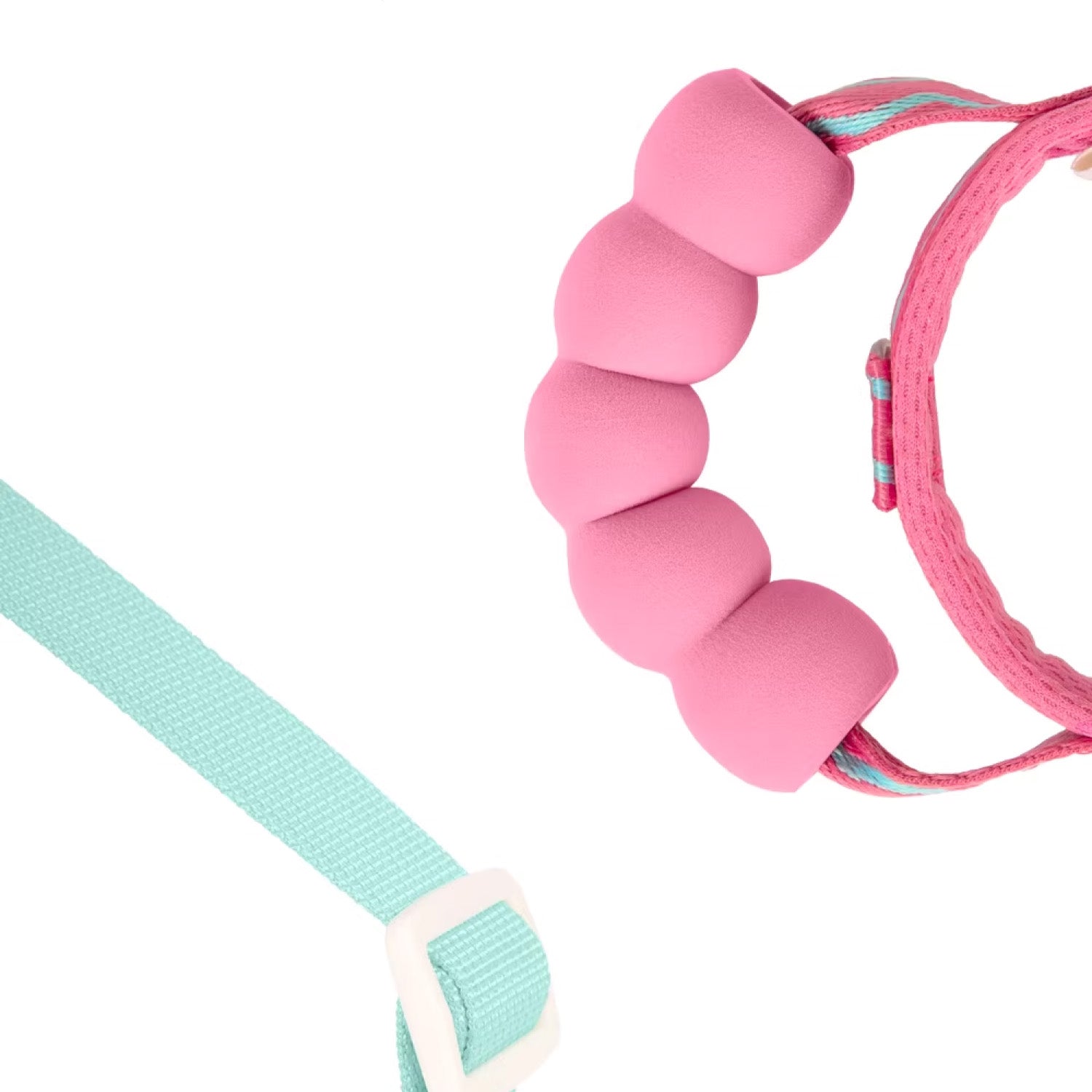 Close-up of soft sponge padded back handle on pink dog harness
