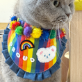 Load image into Gallery viewer, British Shorthair cat wearing rainbow Pride bandana with pom-poms and custom embroidery
