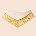 Load image into Gallery viewer, Personalized gold floral jacquard pet bandana with cream lining and engraved name plate on soft beige background
