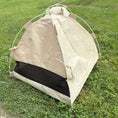 Load image into Gallery viewer, Gravipaw cat tent bed on grass showing the lightweight camping-tent style design
