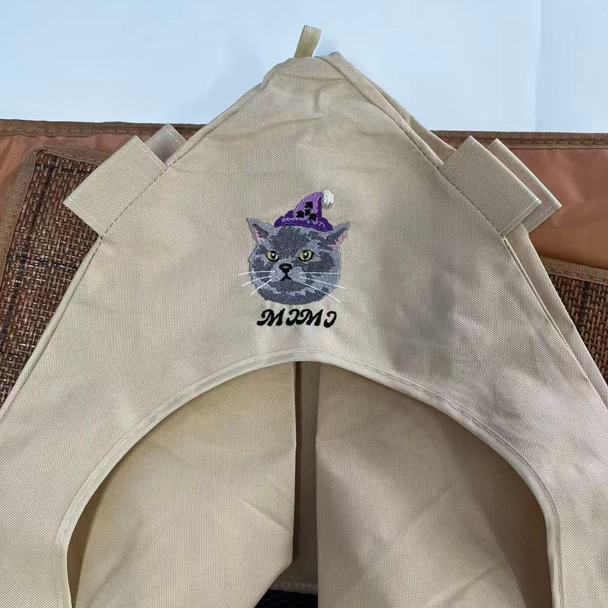 Gravipaw custom embroidered cat tent bed displayed indoors, front view