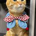 Load image into Gallery viewer, Red white diamond bow bandana collar on orange cat by GraviPaw
